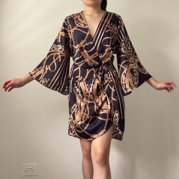 Sheike Dresses & Skirts - Sheike Black and Gold Wrap Dress